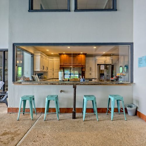 Poolside seats outside the kitchen area. Poolside service from the kitchen!