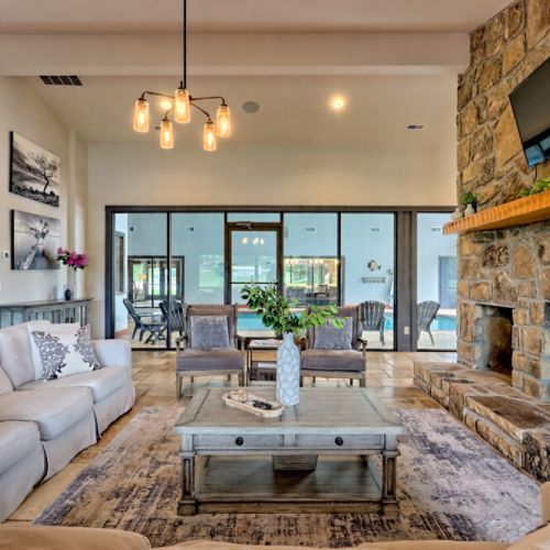 Living room area with gorgeous floor to ceiling views!