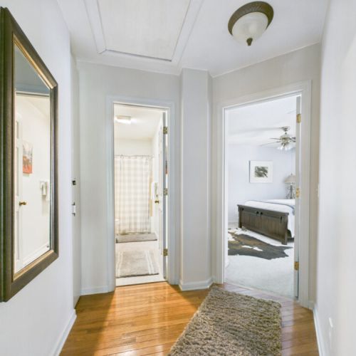 Hallway to second bedroom and bath