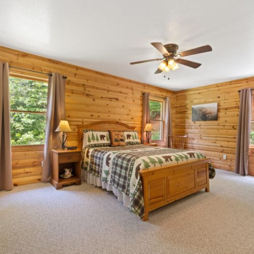 Master bedroom with king sized bed.
