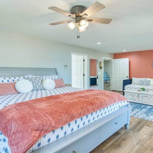 Master bedroom with king bed that looks so inviting.... yours for the booking!