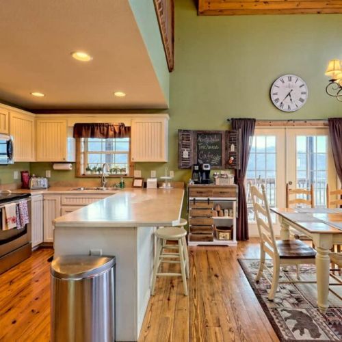 The full view of the kitchen, dining, outdoor area