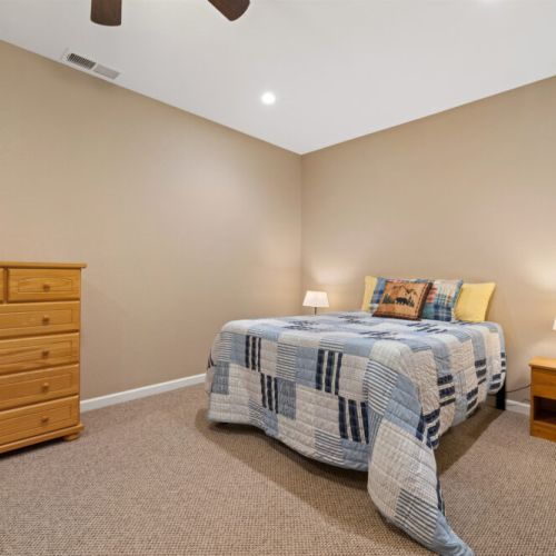 Basement level queen bed.