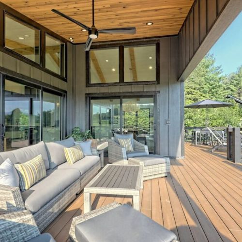 Lots of comfortable seating on the front deck for taking in the view as you sip your wine or, drink your beverage of choice