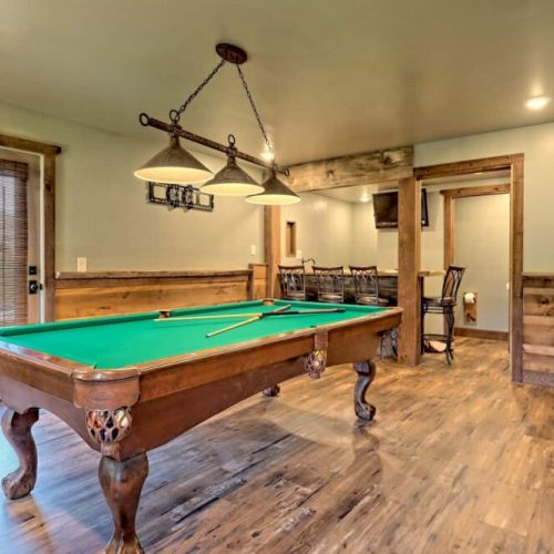 Downstairs gaming area w/ pool table. Time to polish your game!