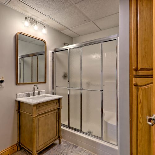 Basement shared bathroom.