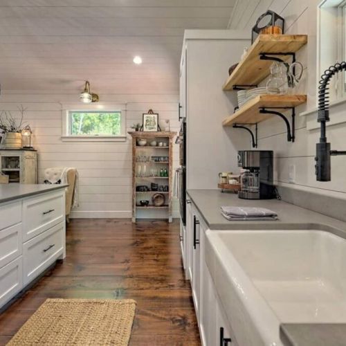 Kitchen w/ large farm style sink and all the amenities