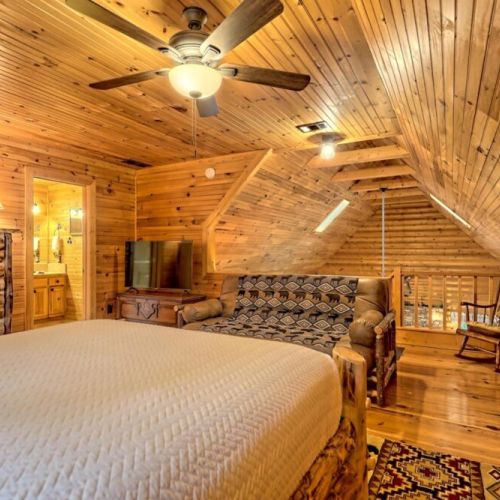 Loft bedroom view towards living room and the lovely vaulted high ceilings