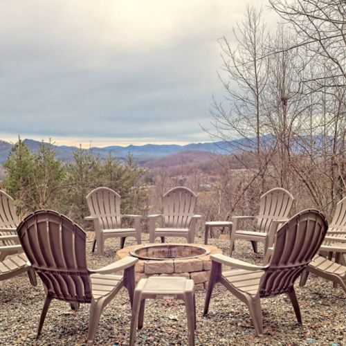 Firepit in the front of the house with mountain view
