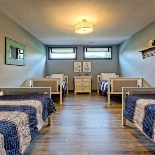 Upstairs bunk rooms with 4 single beds