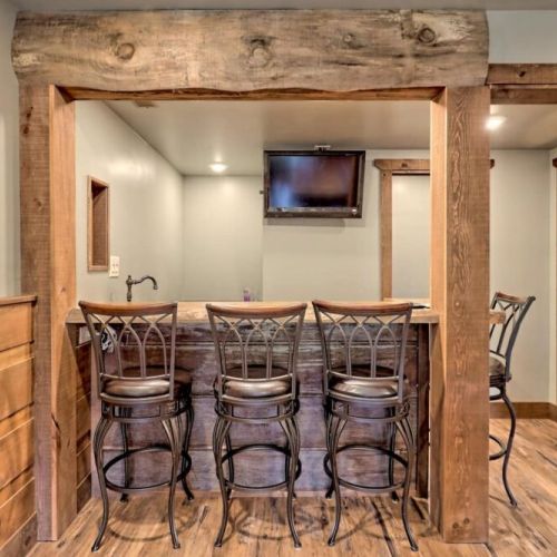 Bar area downstairs with seating for 4, wine fridge and bar sink. Great spot for a party or entertaining.