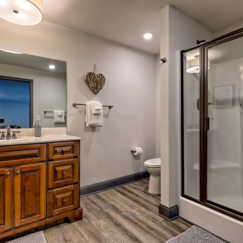 Upstairs bathroom with step in shower