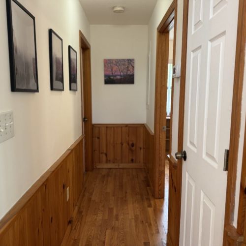 Hallway to bunk room and bathroom.