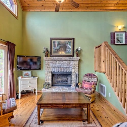 Fireplace and living area and high vaulted ceilings