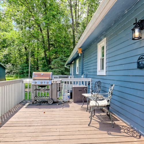Grill and outdoor seating.