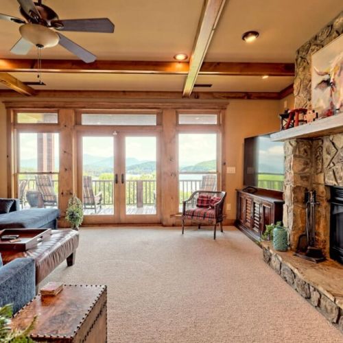 terrace level lounging in front of the huge stone fireplace