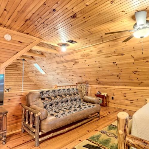 Loft area with a nice sofa sitting area and King bed