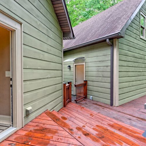 Side entrance on left and garage apartment entrance to the right.