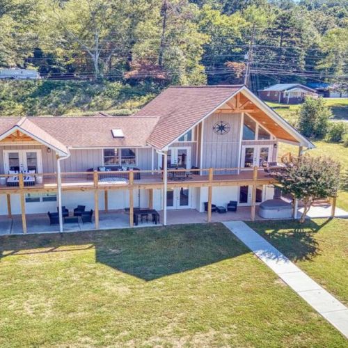 Aerial view of this majestic sprawling waterfront home!