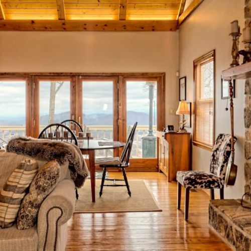 Dining area for 4. Look at that view that you have while sitting down to dinner or entertaining. And the pictures you can take outside.