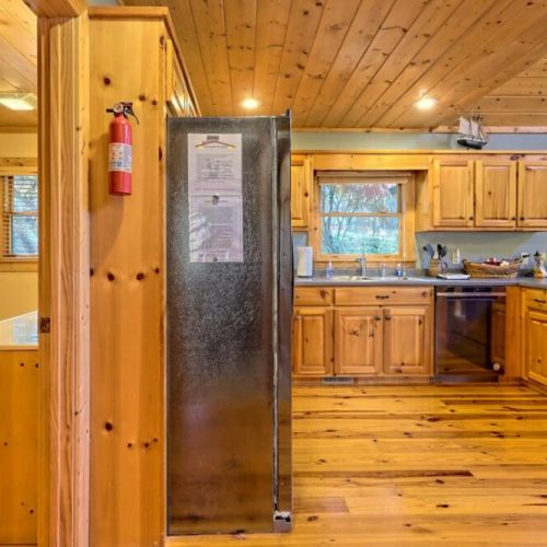 Guest bathroom and view of the kitchen