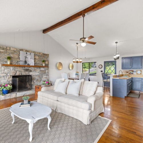 View into the kitchen and dining from the living area.