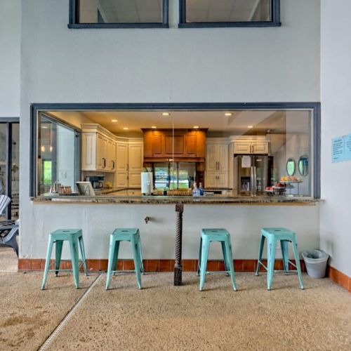 Poolside seats outside the kitchen area. Poolside service from the kitchen!