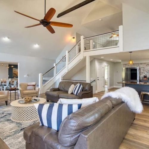 Open living area with stairs to upper level. Breakfast bar seating for 4.