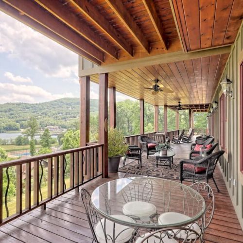 Plenty of seating to relax or dine on the deck level while admiring the view