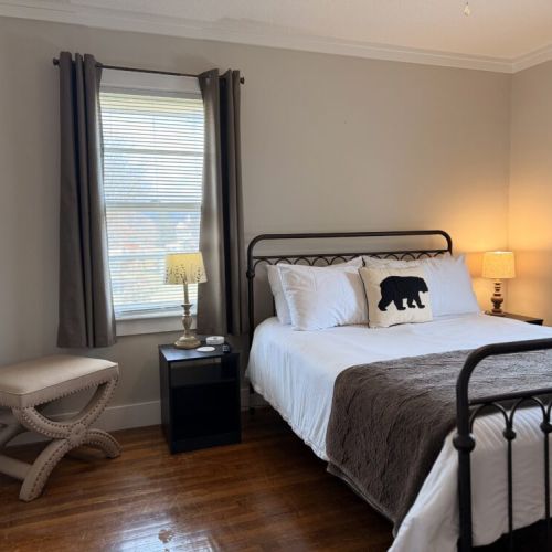 Queen bedroom with TV.