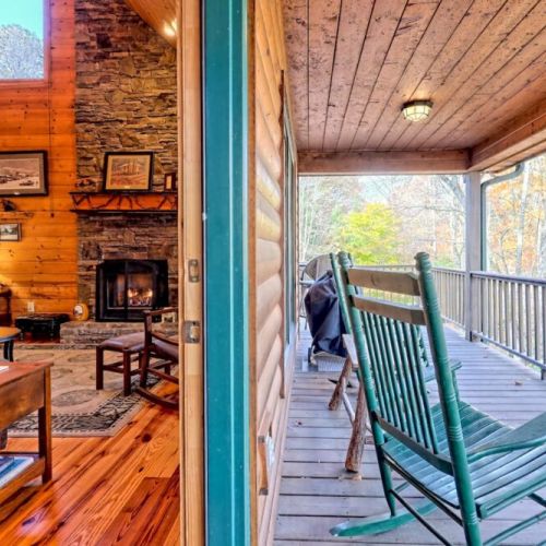 Main floor porch complete with rocking chairs!! Now this is a true mountain cabin just waiting for you and your loved ones!