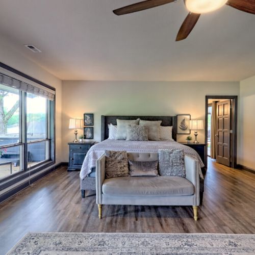 Master bedroom with entry to the pool or outdoor entry to the hot tub and backyard area