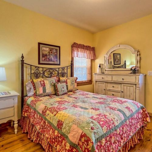 Another sweet guest room with a private entry onto the deck and taking in those views!