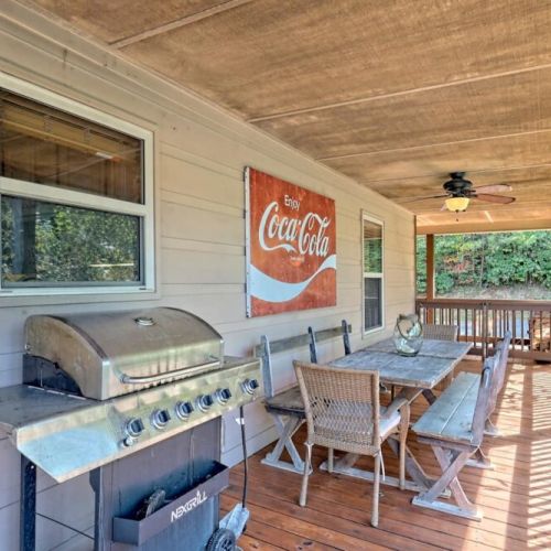 Outdoor dining and gas grill BBQ on middle deck
