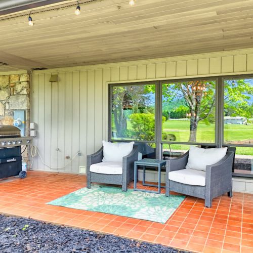 Front of house, equipped with a grill.