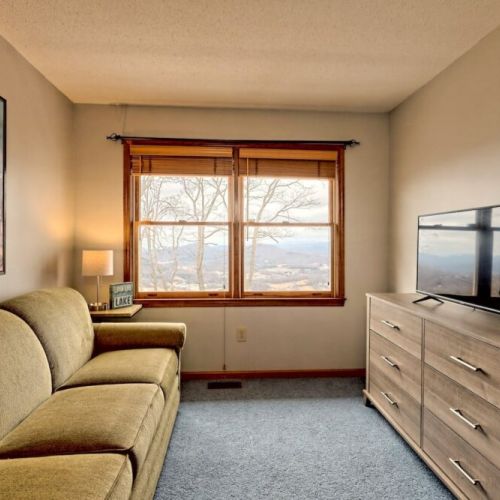 Lounging area of loft bedroom
