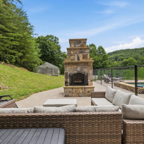 Outside living area with fireplace.