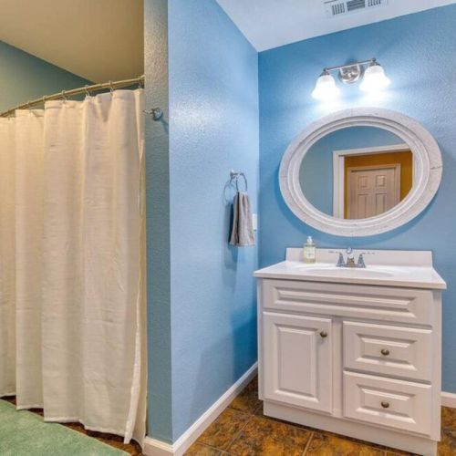 Guest bathroom with walk in shower.