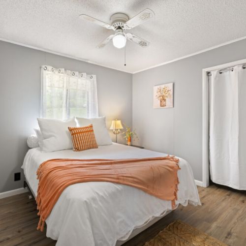 1st bedroom with queen bed.