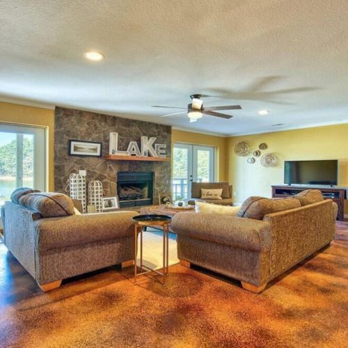 Downstairs living area with french door access to lower deck and hot tub