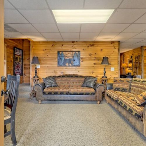 Downstairs living area with 2 large sofa to lounge on or watch a good movie!
